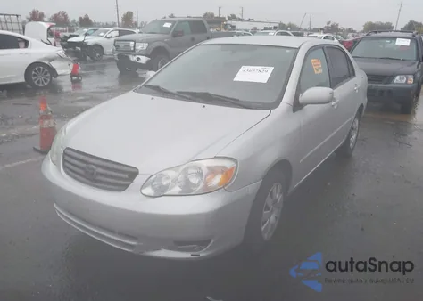 2003 Toyota Corolla Le z USA, uszkodzony, nr VIN JTDBR32E730041318